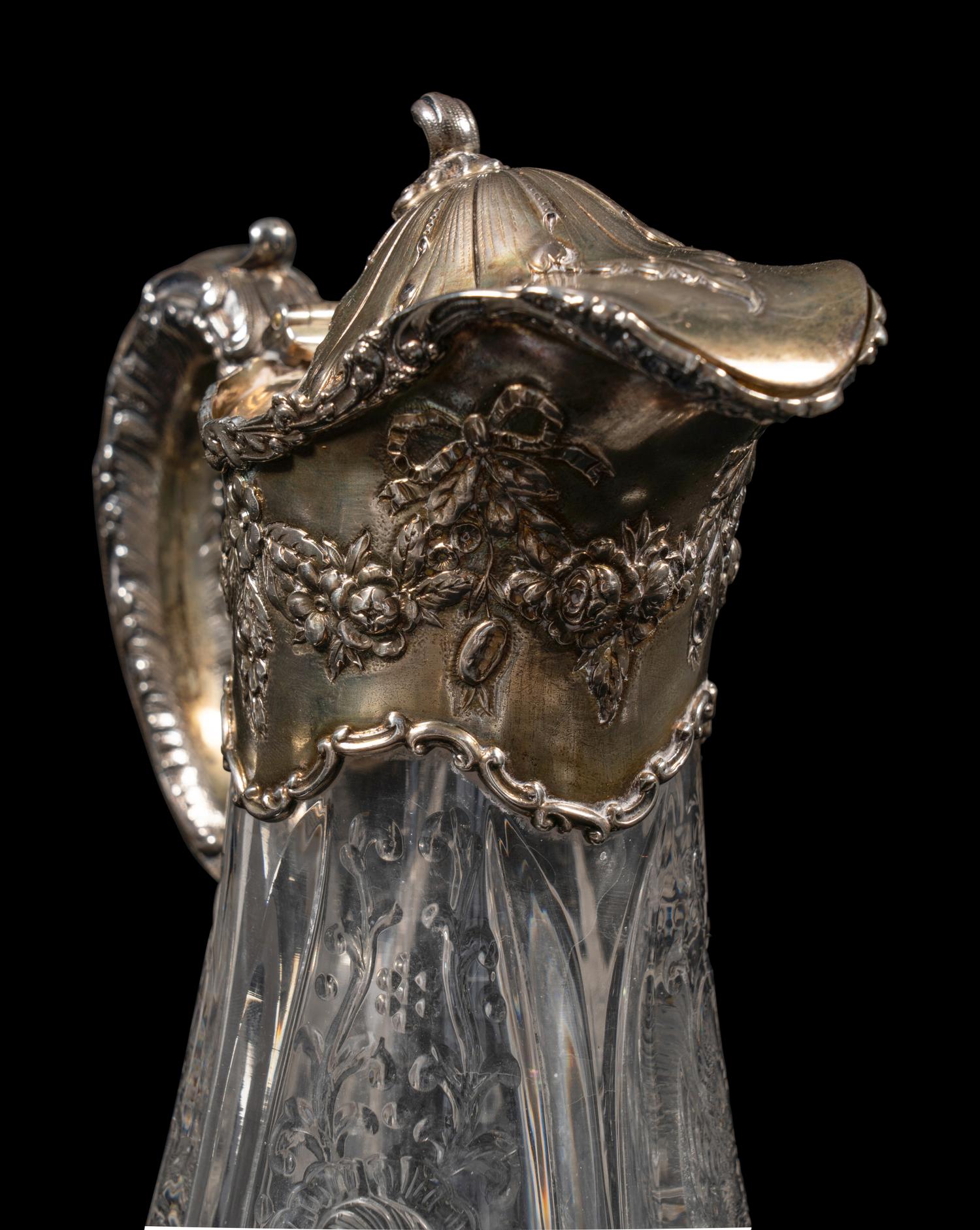 An American Silver Mounted Cut Glass Claret Jug