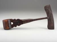 A Carved Wood and Iron Whaling Tool