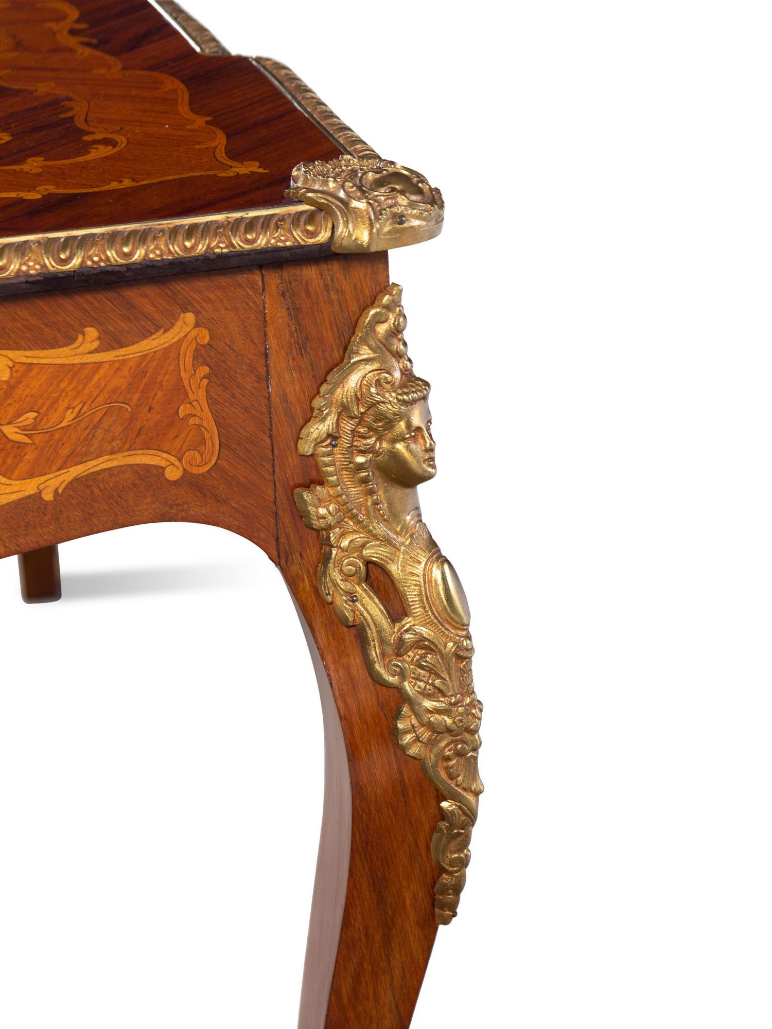 A Louis XV Style Gilt Bronze Mounted Kingwood and Marquetry Low Table