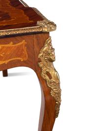 A Louis XV Style Gilt Bronze Mounted Kingwood and Marquetry Low Table
