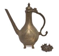 A Middle Eastern Bronze Teapot, Height 12 inches.