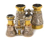 Two Pairs of Continental Silver or Silvered Metal Cased Opera Glasses, Width of first 4 1/2 inches.