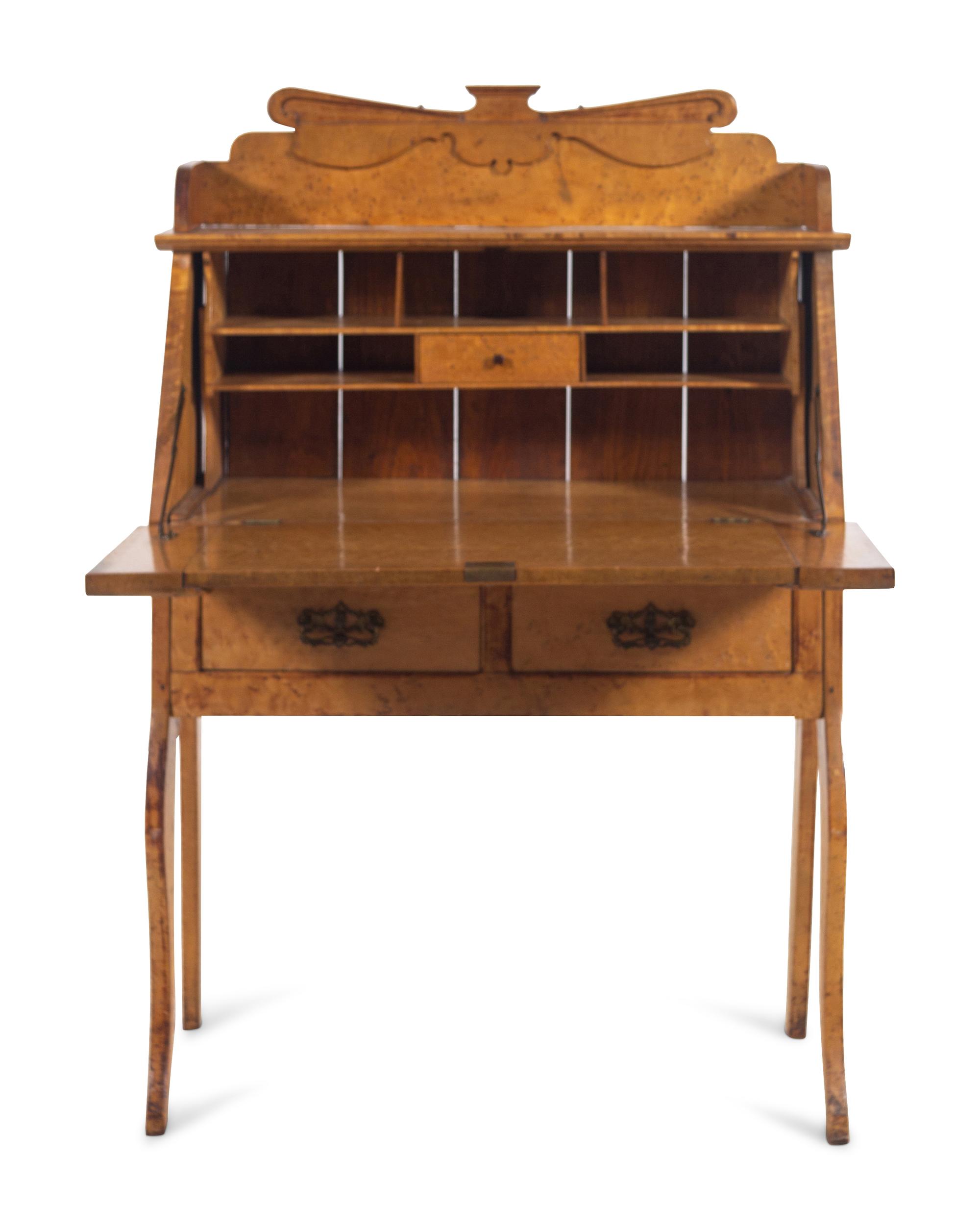 An Austrian Birdseye Maple Slant-Front Desk