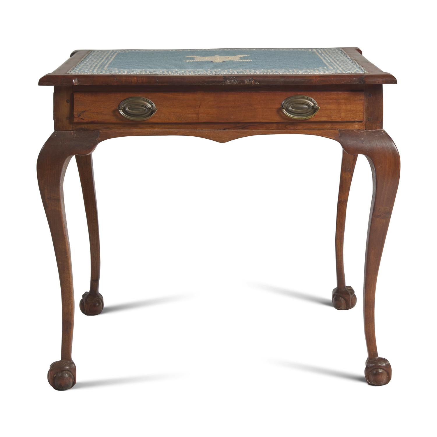 A Chippendale Style Mahogany Games Table Inset with Needlepoint Top