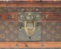 A Louis Vuitton Monogrammed Canvas Hardsided Trunk with 'JG' Monogram