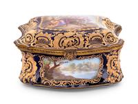 A Sèvres Style Painted and Parcel Gilt Porcelain Table Casket