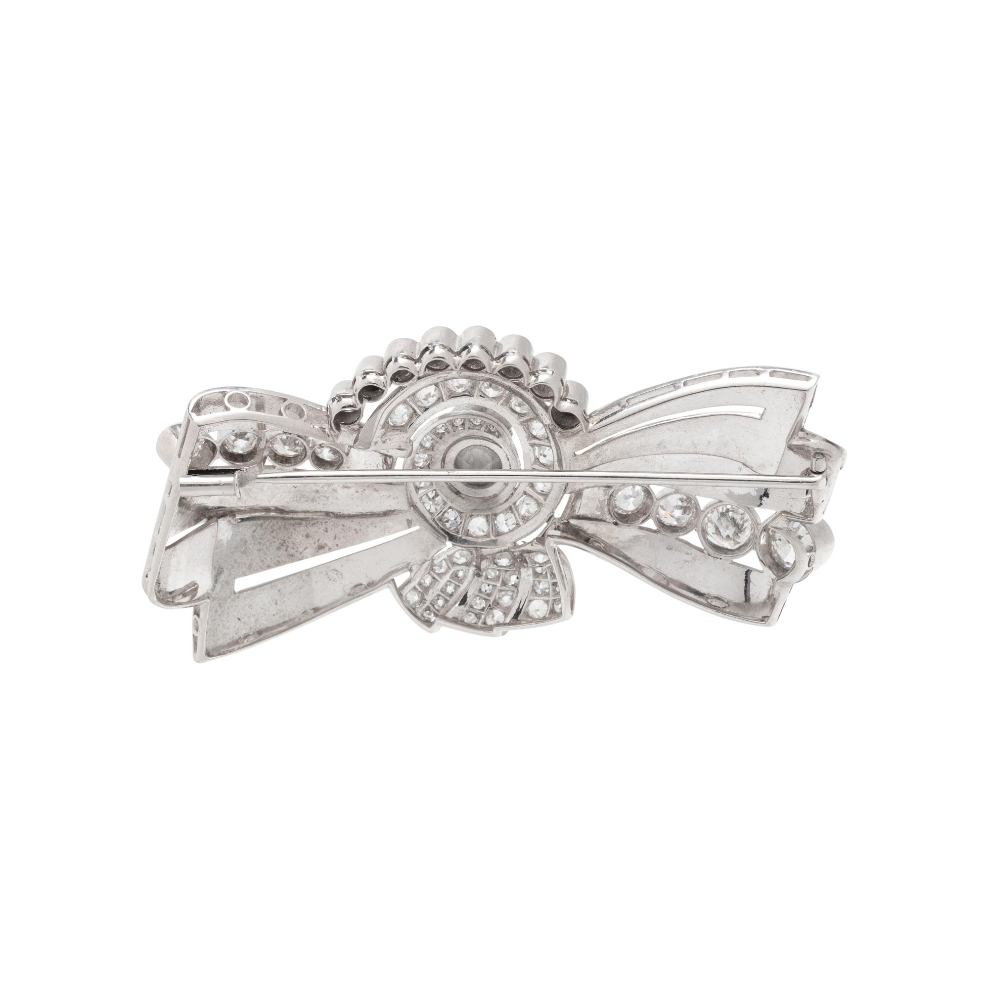 RETRO, PLATINUM AND DIAMOND BROOCH