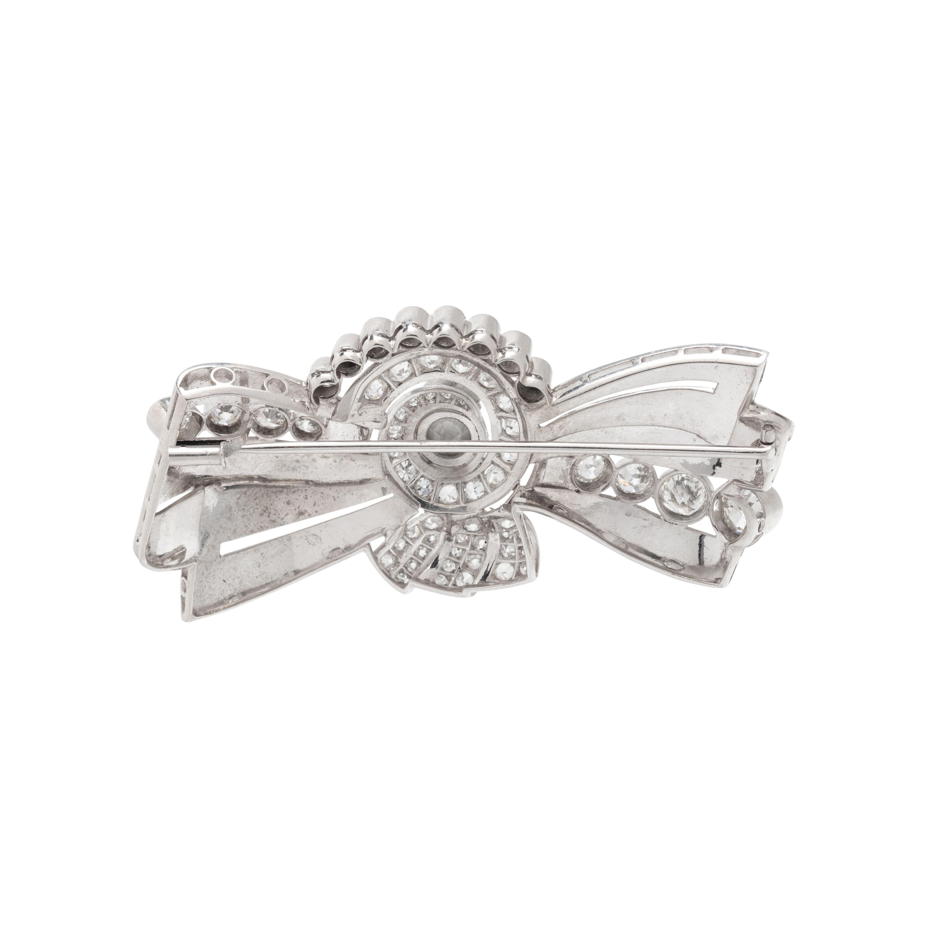 RETRO, PLATINUM AND DIAMOND BROOCH