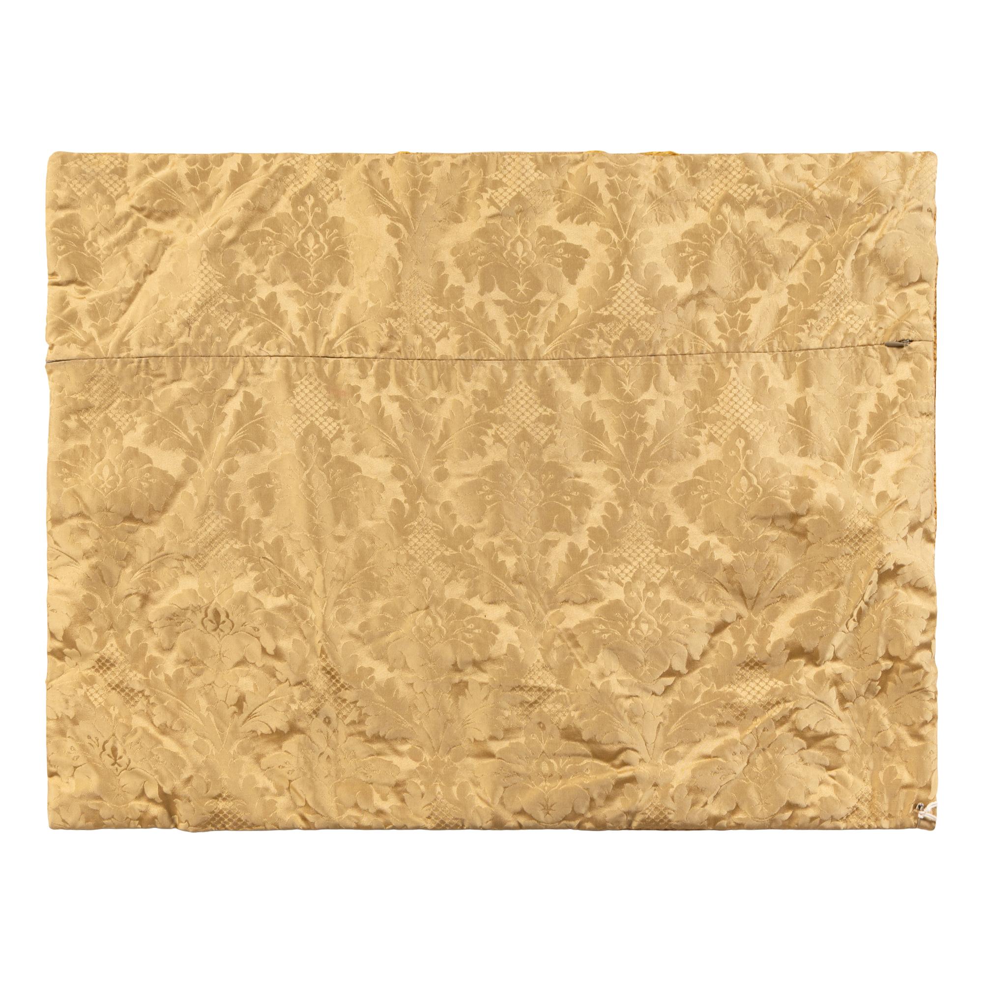 A Gold Silk Damask Panel with Needlework Appliqu é , Now Mounted as a Cushion Cover