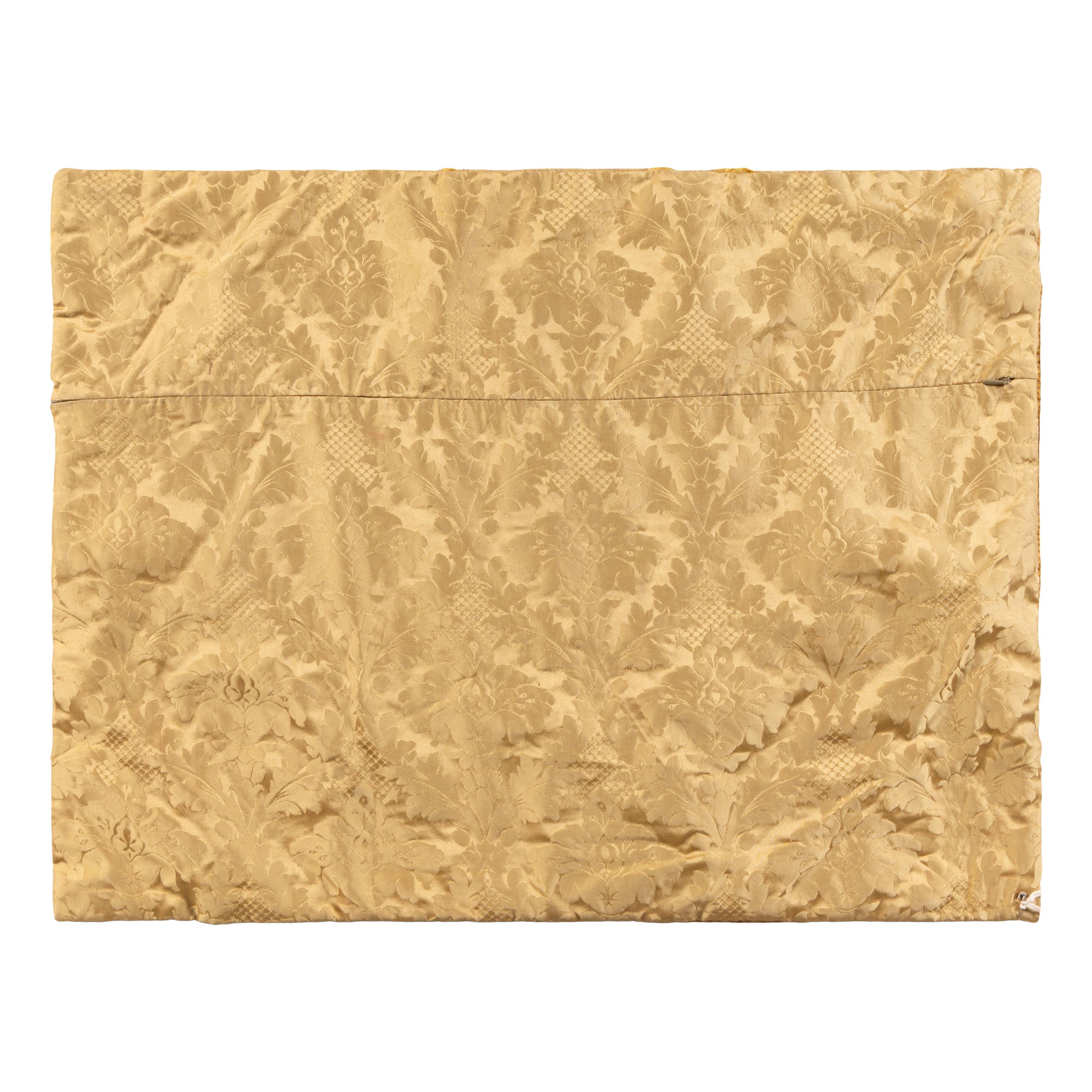 A Gold Silk Damask Panel with Needlework Appliqu é , Now Mounted as a Cushion Cover