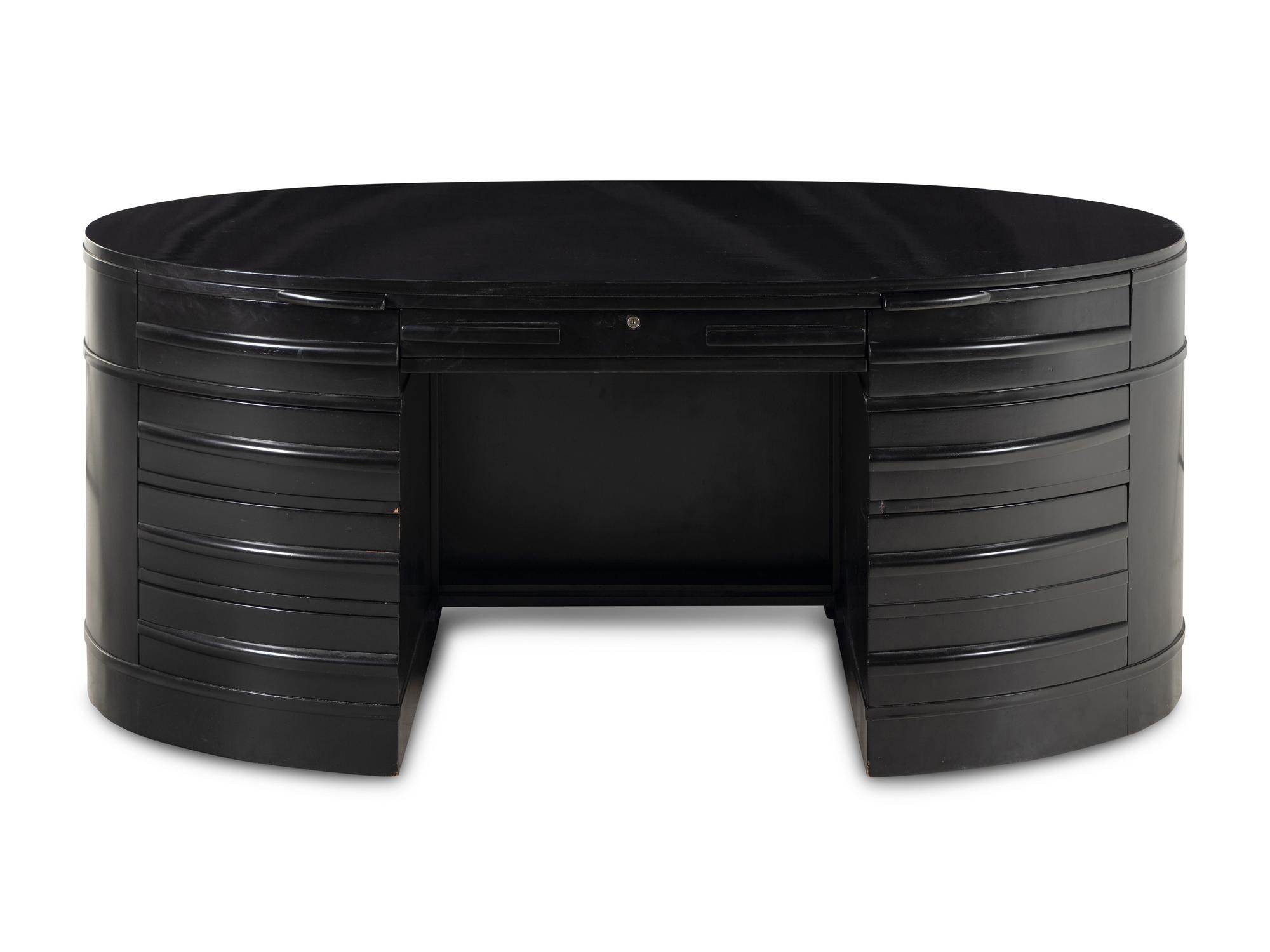 An Ebonized Oval Desk