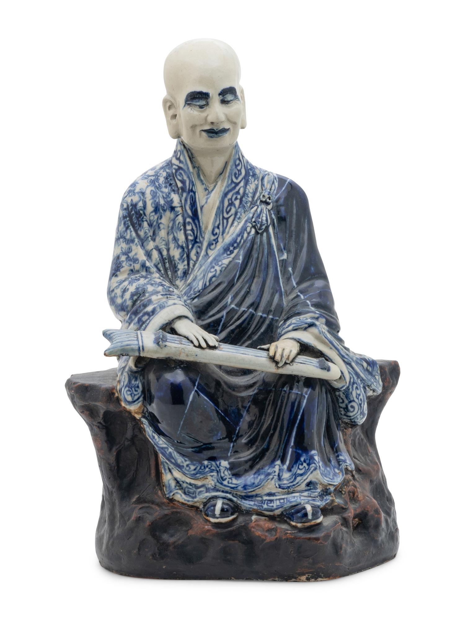 A Chinese Blue and White Ceramic Figure of a Luohan