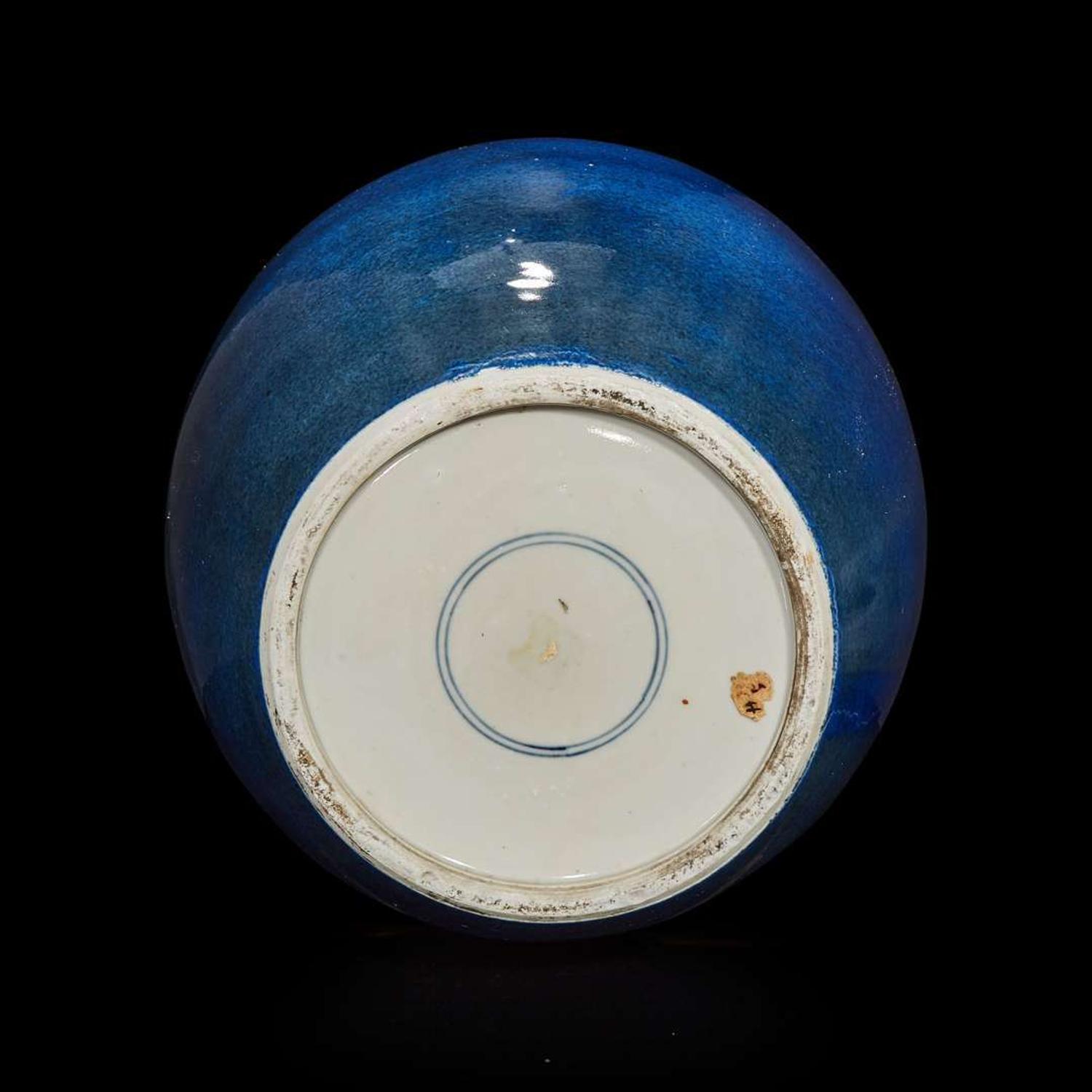 A Chinese powder-blue glazed teapot and cover and an ovoid jar 18th/19th century