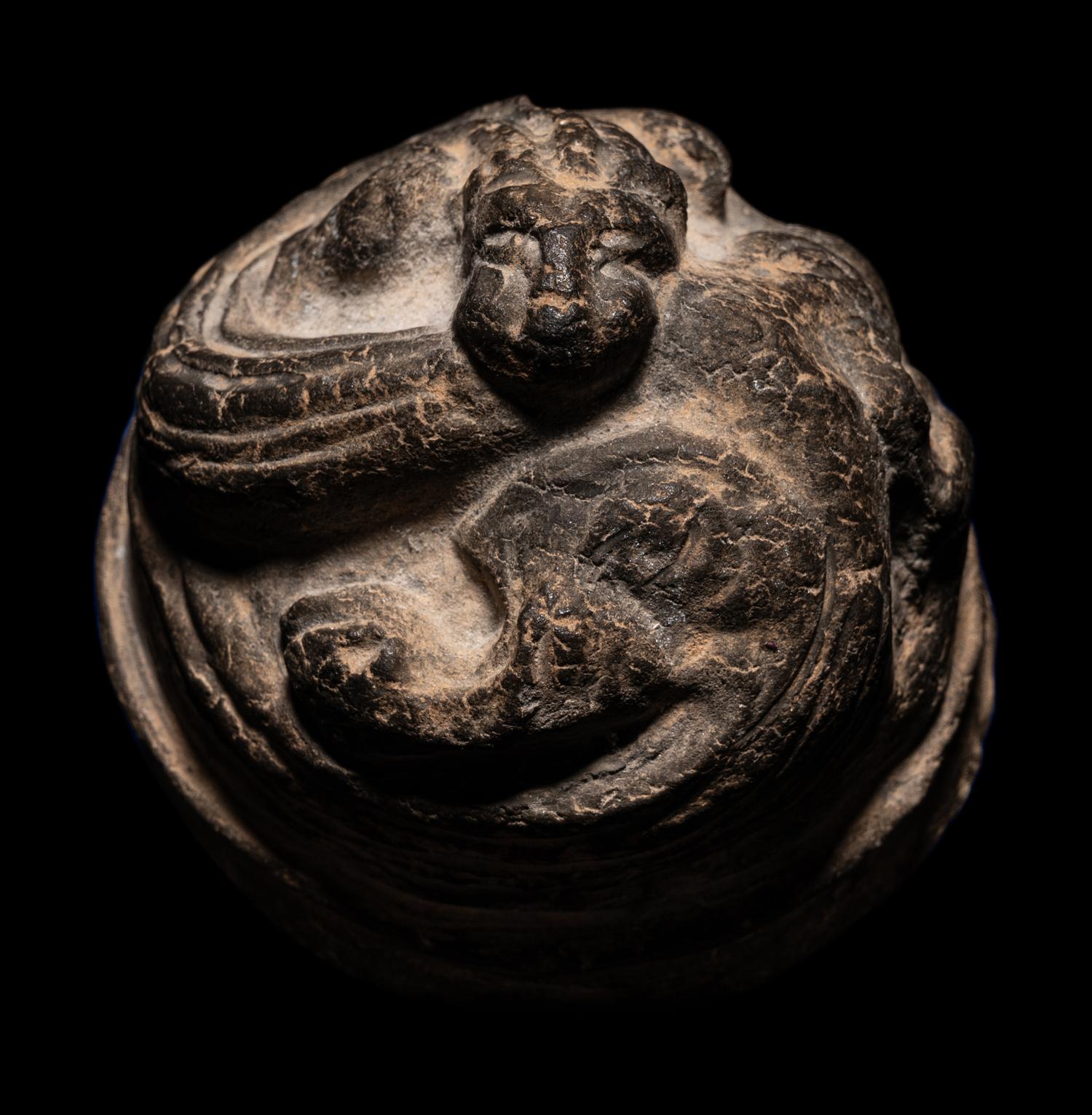 A Chinese Grey Pottery Weight