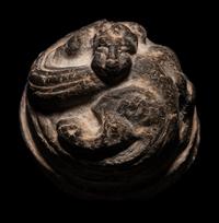 A Chinese Grey Pottery Weight
