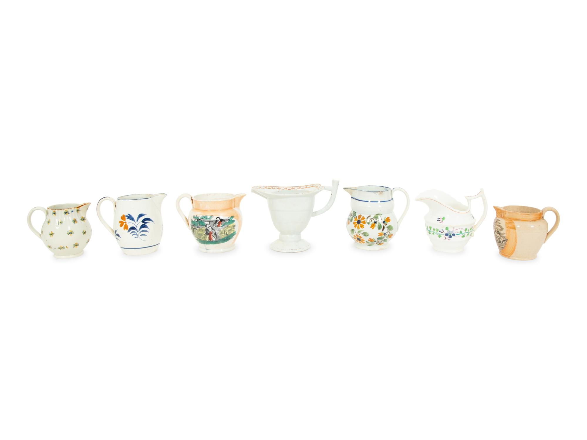 Seven Staffordshire Creamers