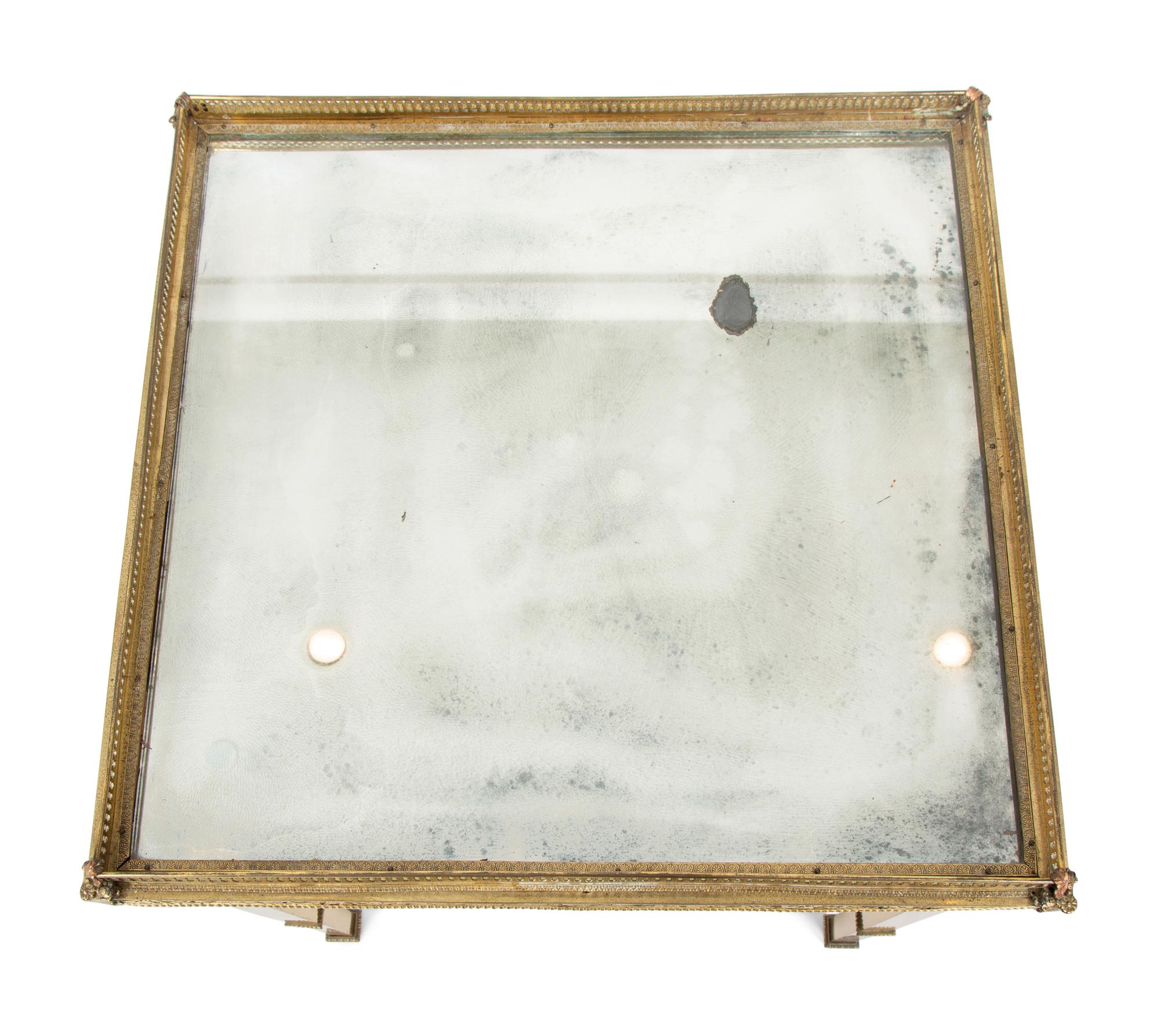 A French Gilt Bronze and Mirror Side Table — 20TH CENTURY