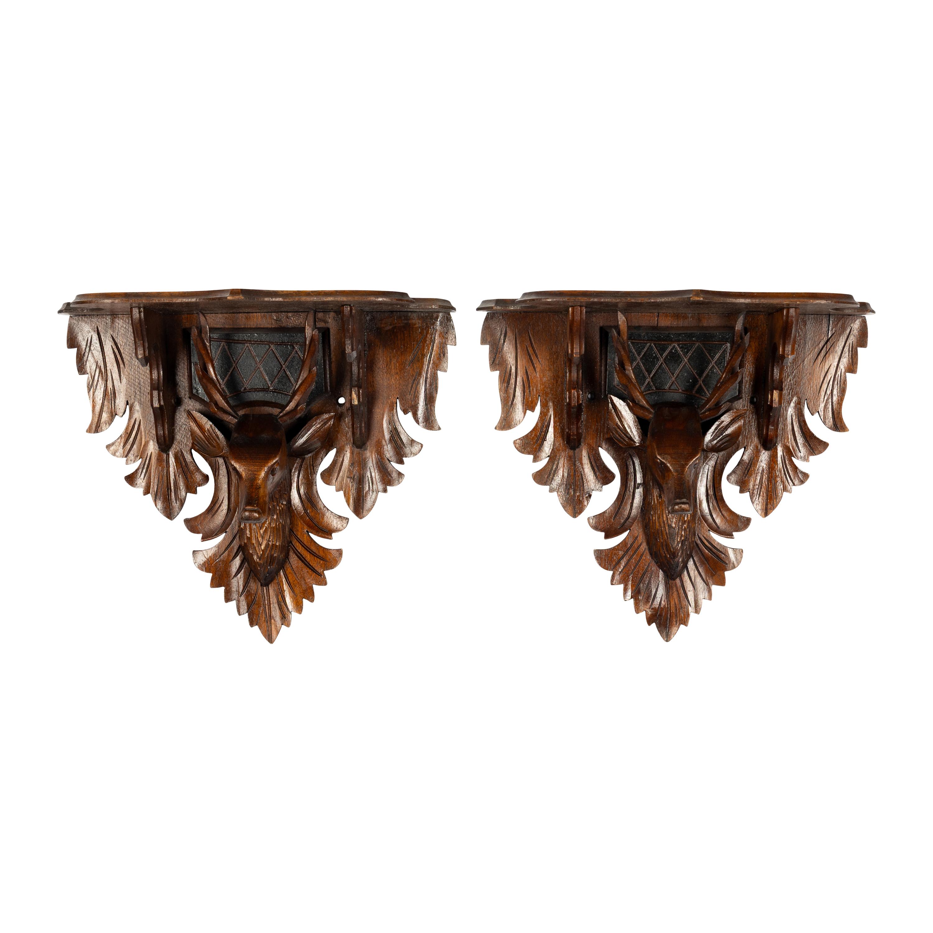 A Pair of Carved Wood Stag Wall Brackets