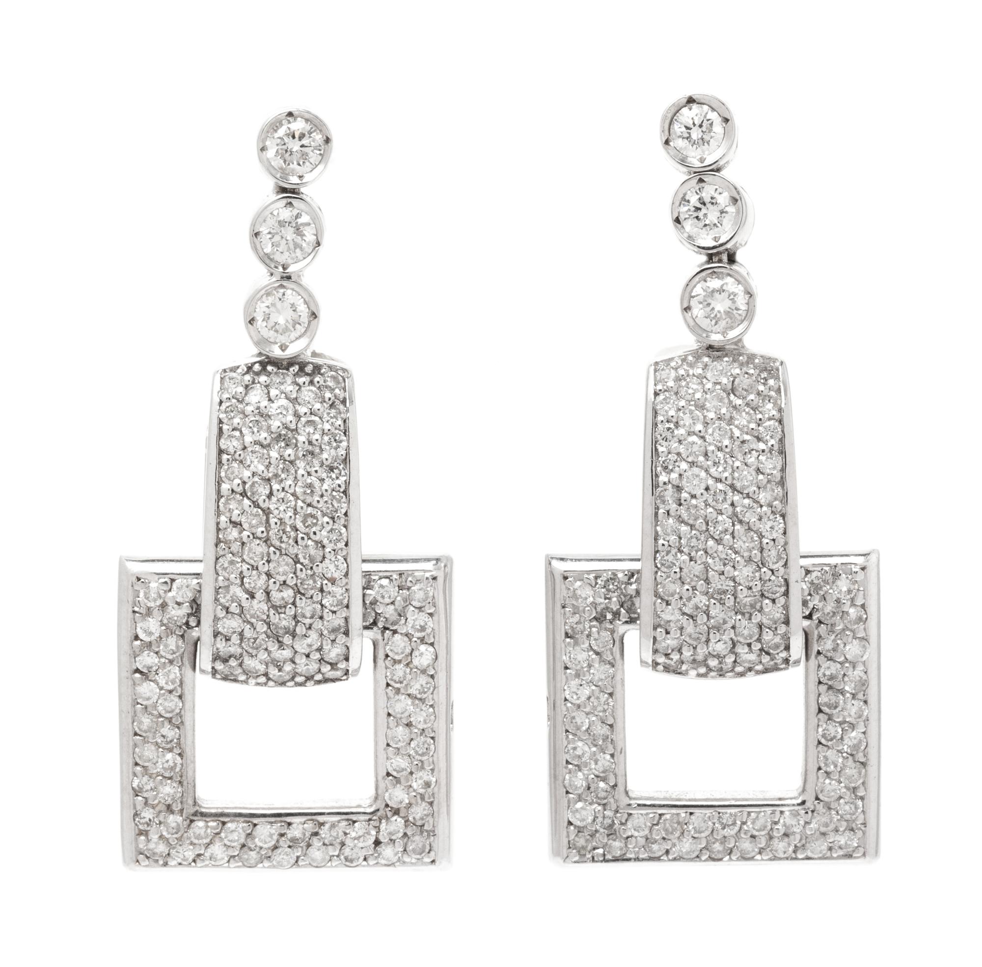 An 18 Karat White Gold and Diamond Demi-Parure, 78.00 dwts.