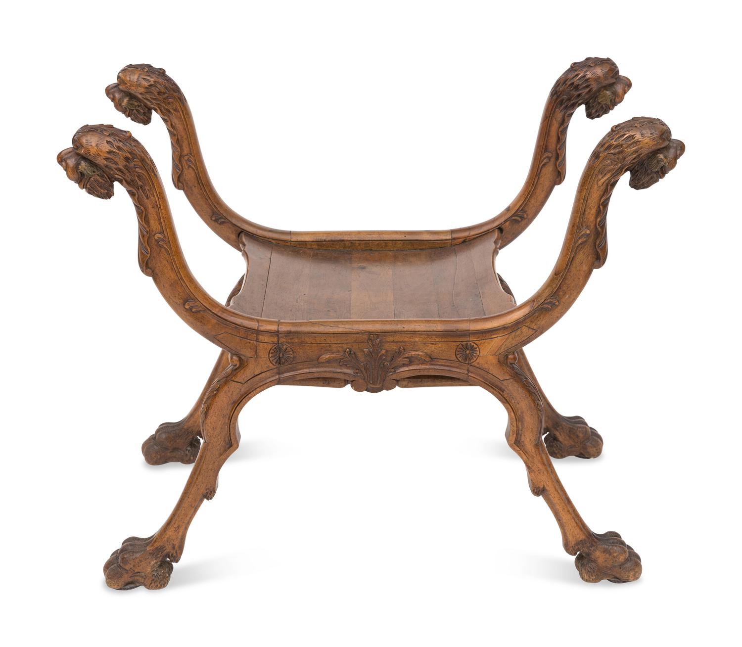 A Renaissance Revival Carved Walnut Curule Bench