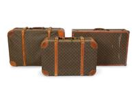 Three Louis Vuitton Travel Cases — 20TH CENTURY