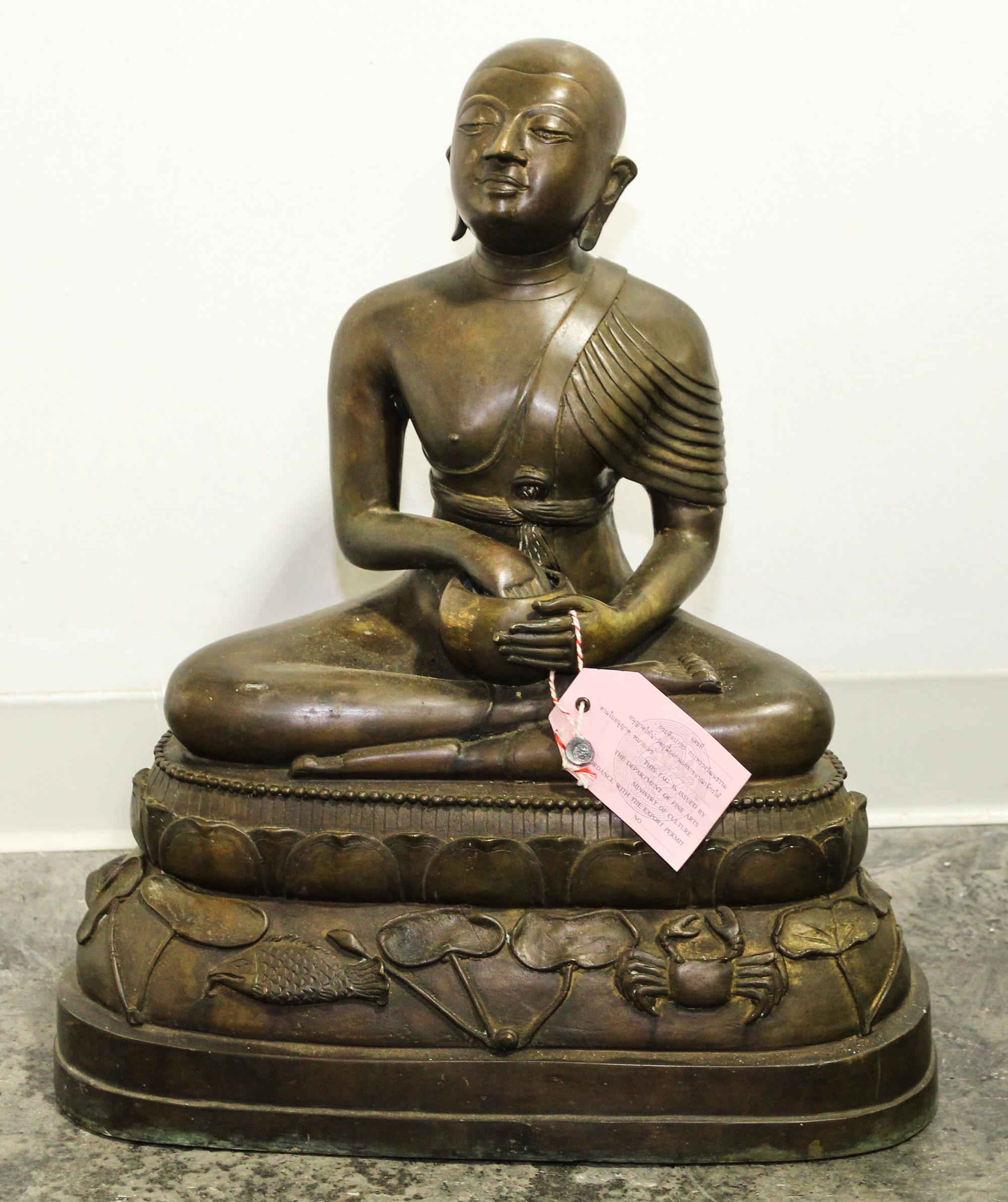 A Bronze Seated Buddha. Height 20 1/2 inches.