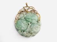 A 14K Yellow Gold and Carved Jade Pendant