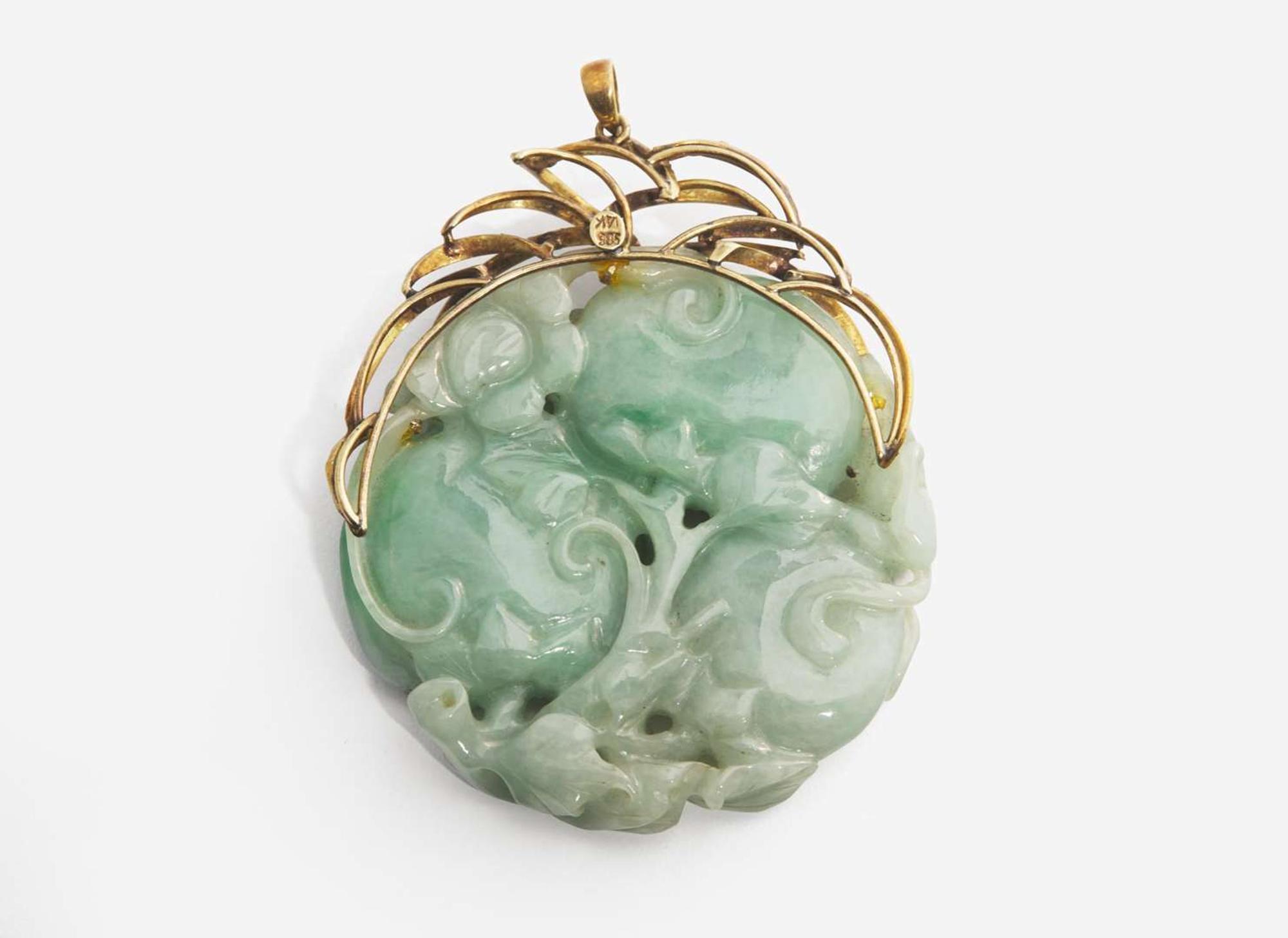 A 14K Yellow Gold and Carved Jade Pendant