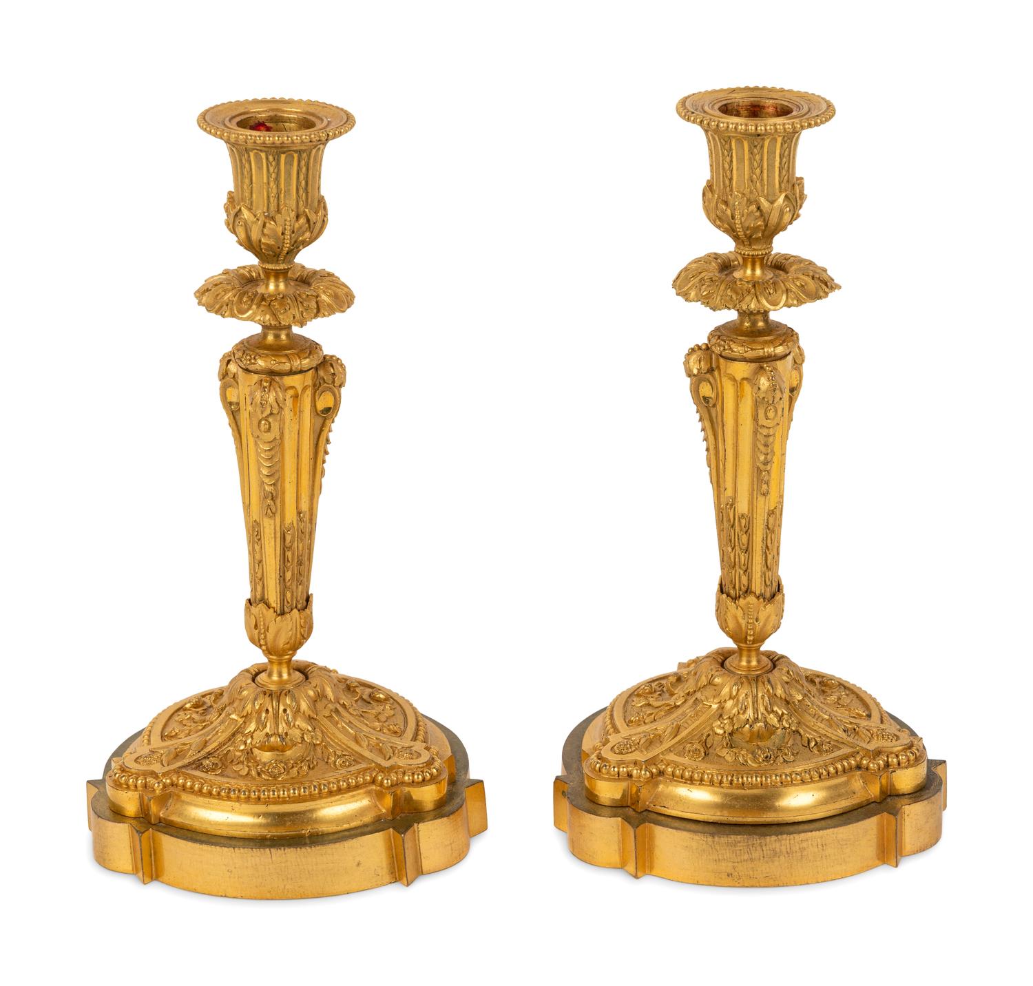 A Pair of Continental Gilt Bronze Candlesticks