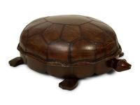 A Carved Wood and Leather Turtle Foot Stool — LATE 20TH CENTURY