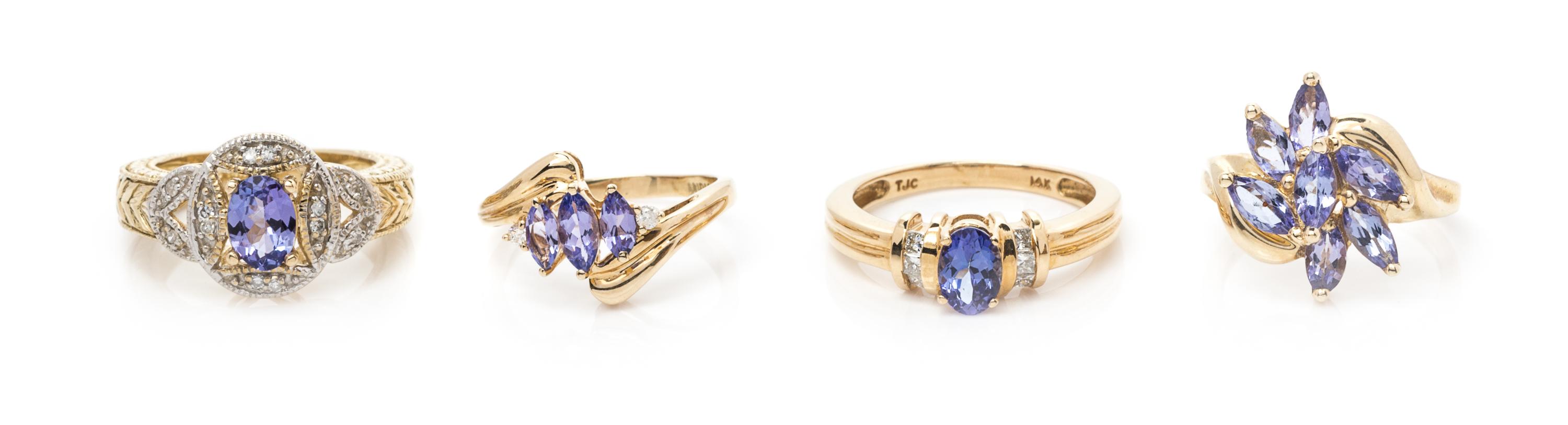 A Collection of 14 Karat Yellow Gold, Tanzanite and Diamond Rings, 9.30 dwts.