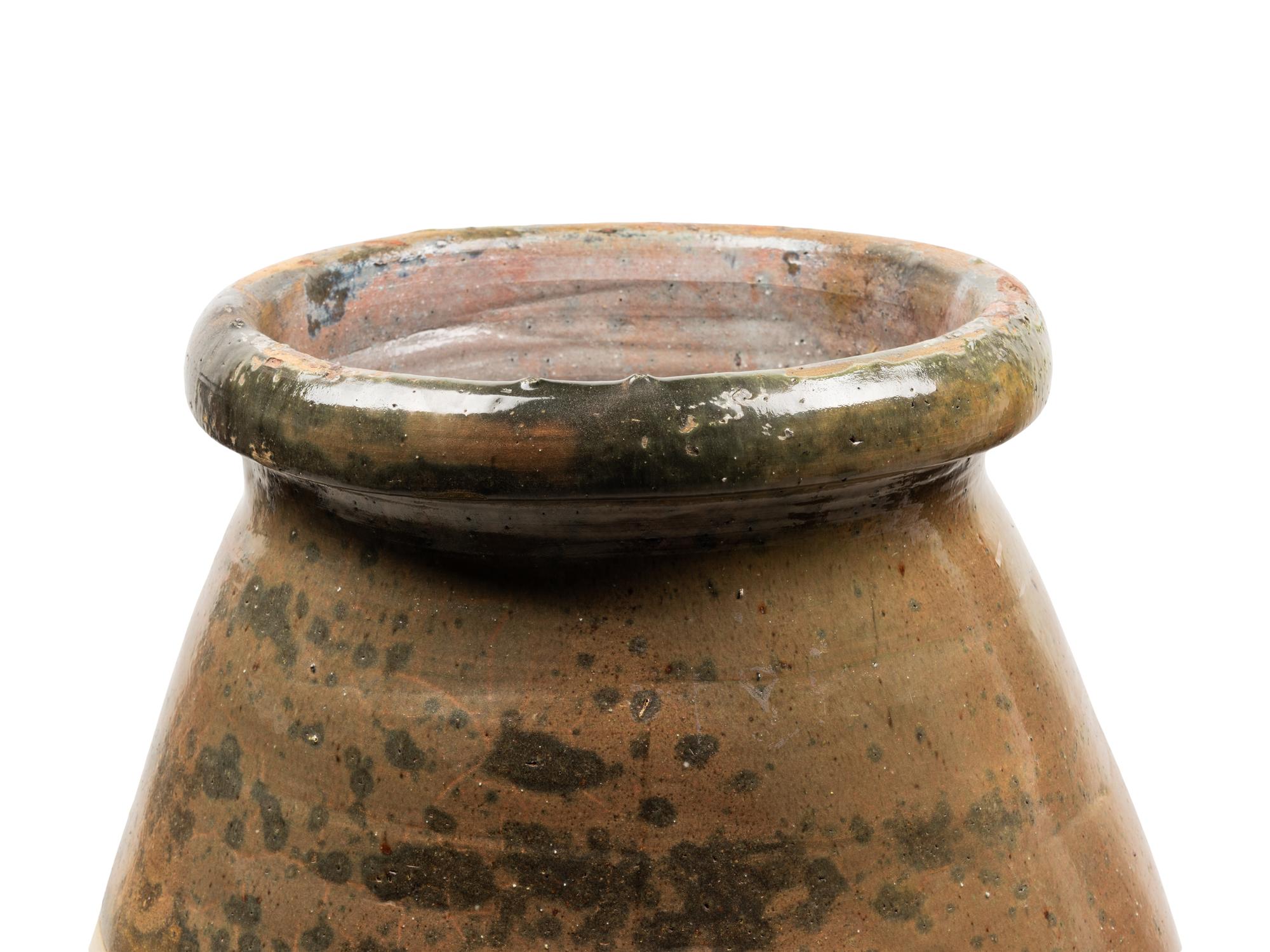 A Slip Glazed Pottery Storage Jar