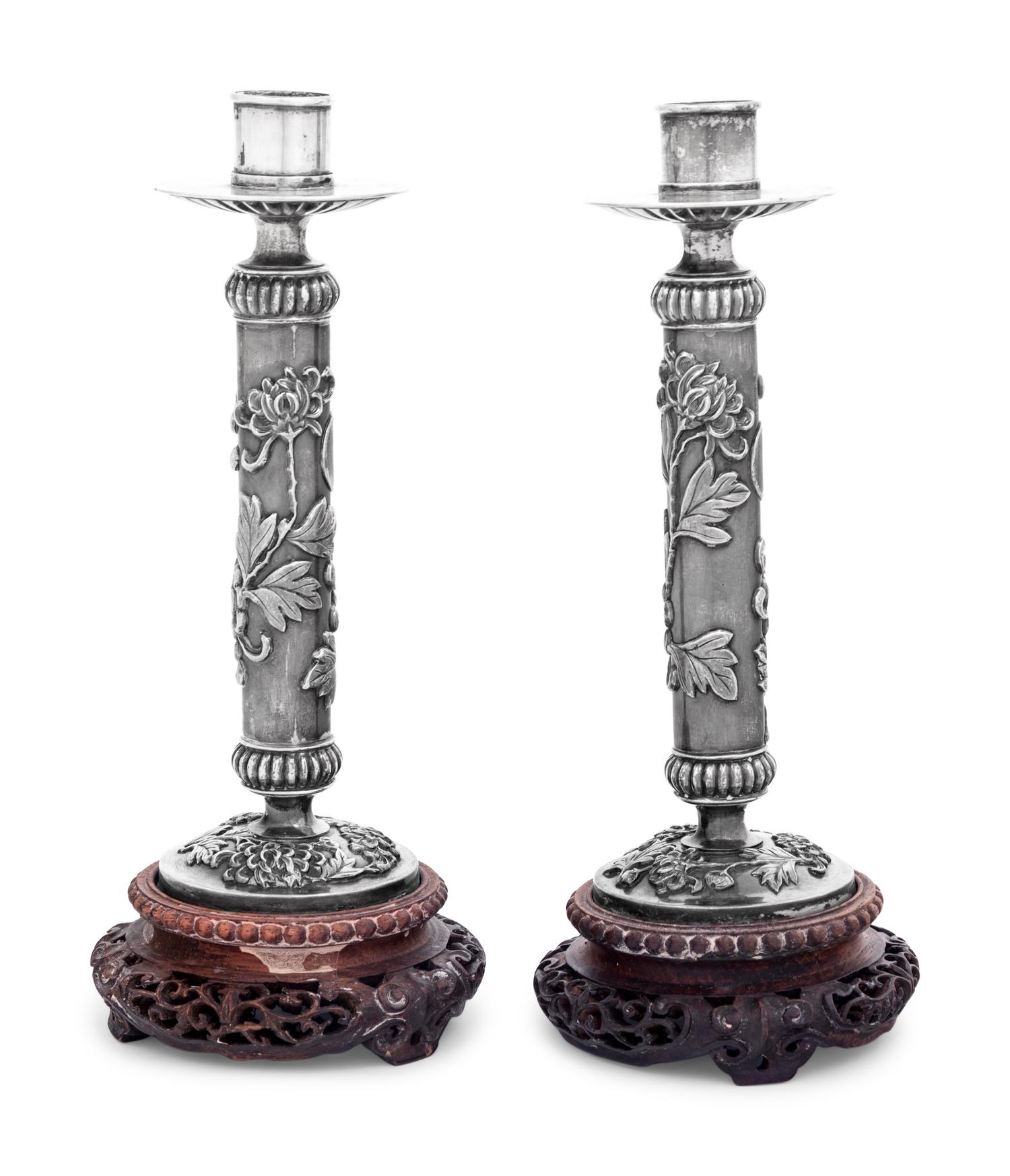 A Pair of Silver Candlesticks