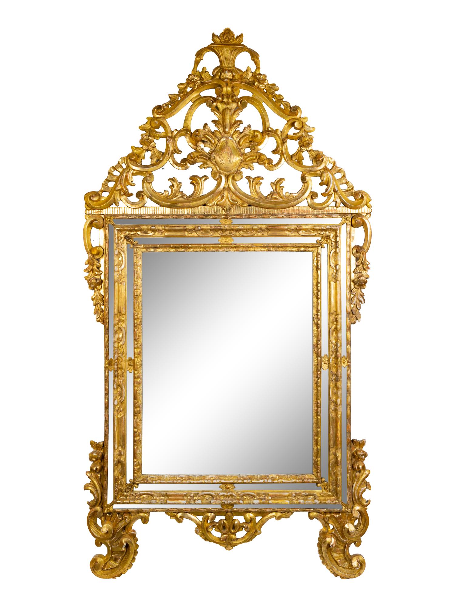 An Italian Baroque Style Giltwood Mirror