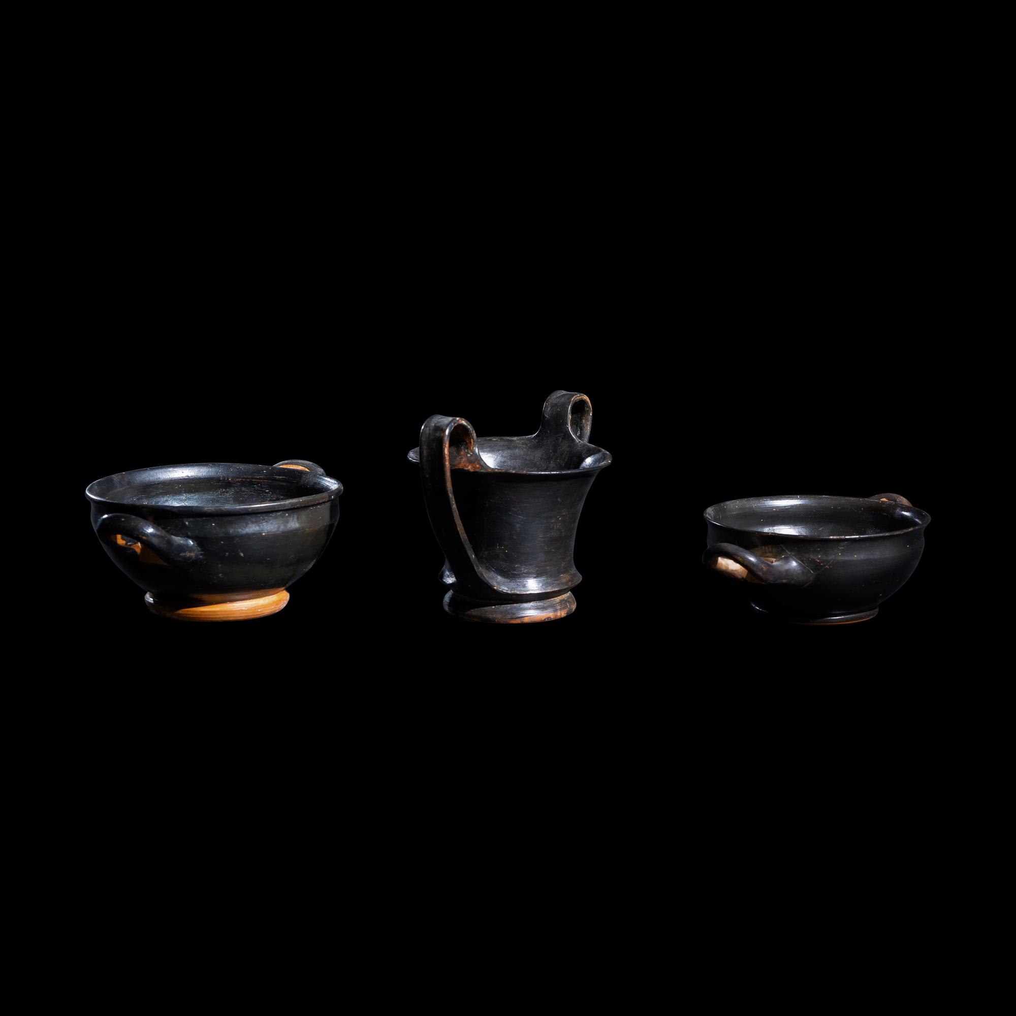 A Group of 7 Greek Black-Glazed Vessels