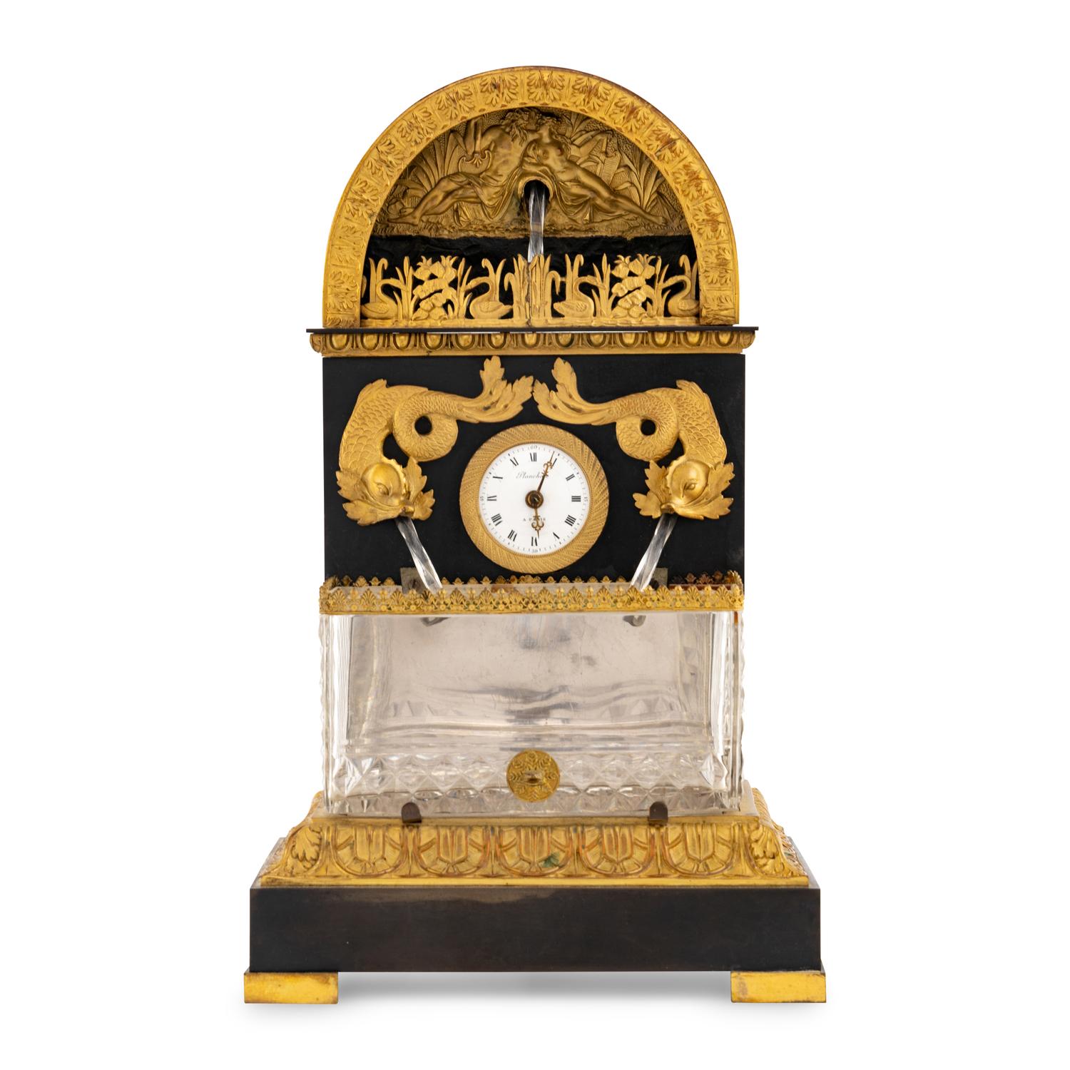 A French Patinated and Gilt Bronze and Cut Glass "Fountain" Mantel Clock