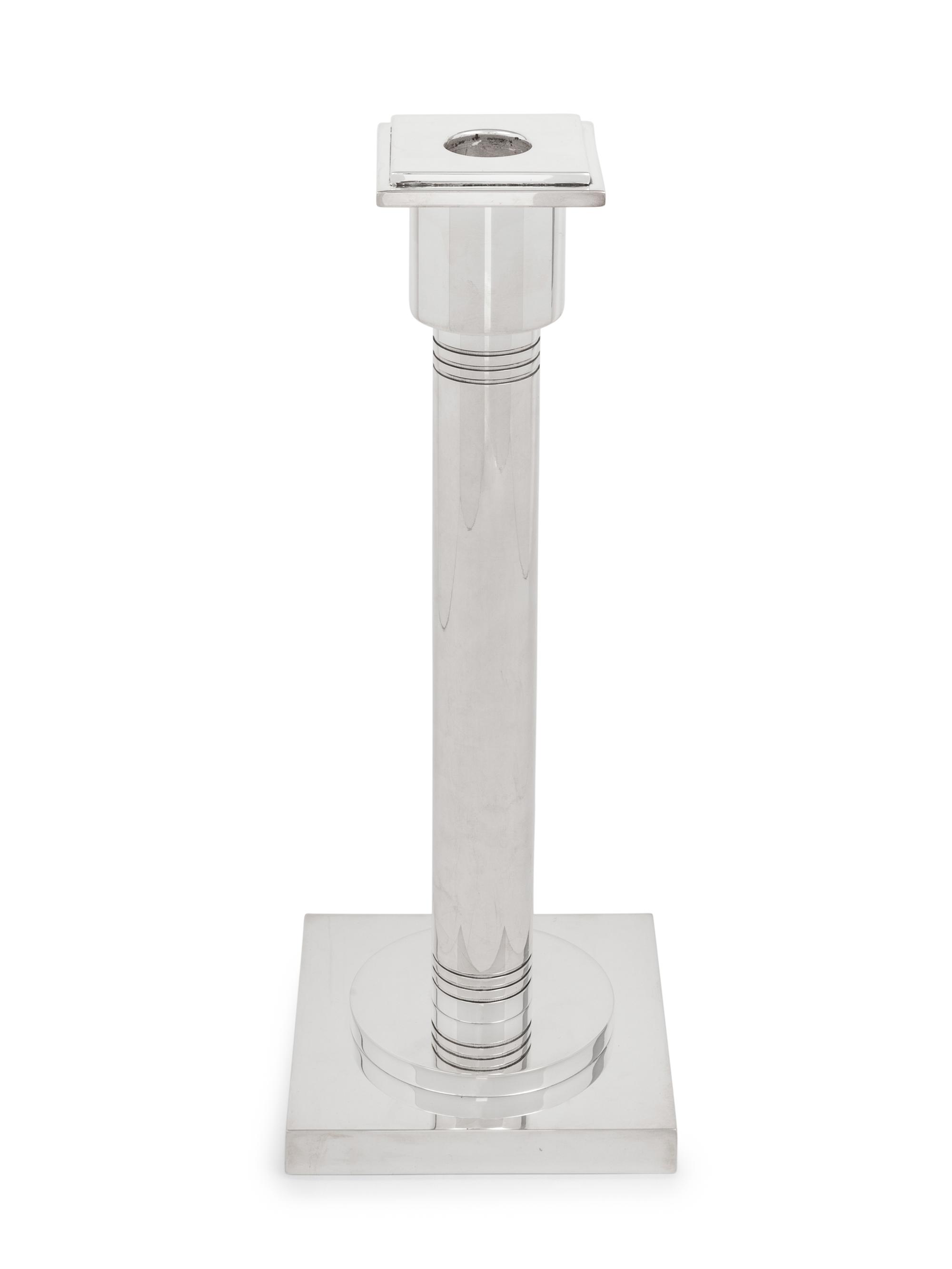 A Set of Four Art Deco Style Silver-Plate Candlesticks