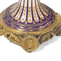 A Large Sévres White-Ground Porcelain and Gilt Bronze Mounted Urn