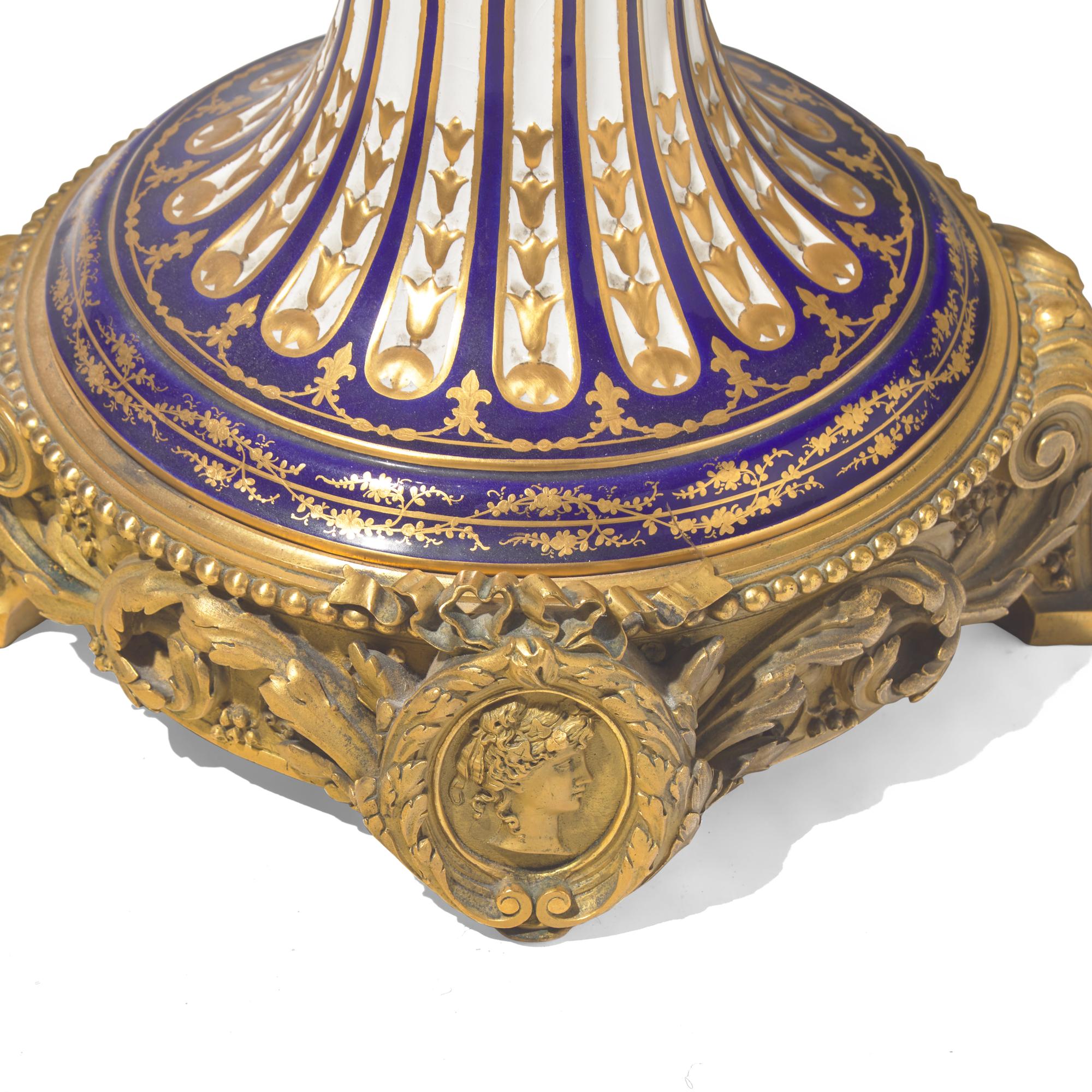 A Large Sévres White-Ground Porcelain and Gilt Bronze Mounted Urn