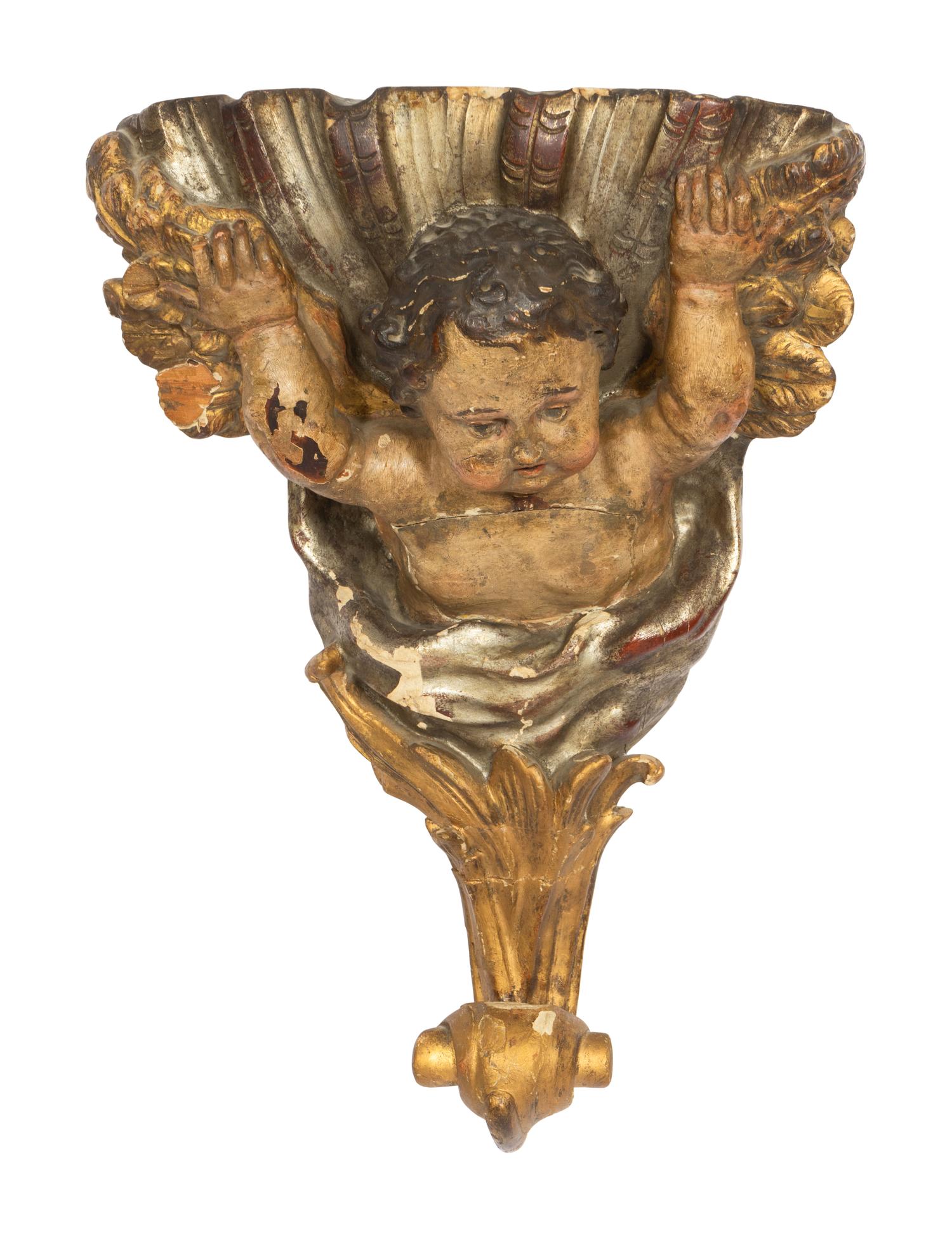 An Italian Carved and Polychrome Decorated Corner Wall Bracket