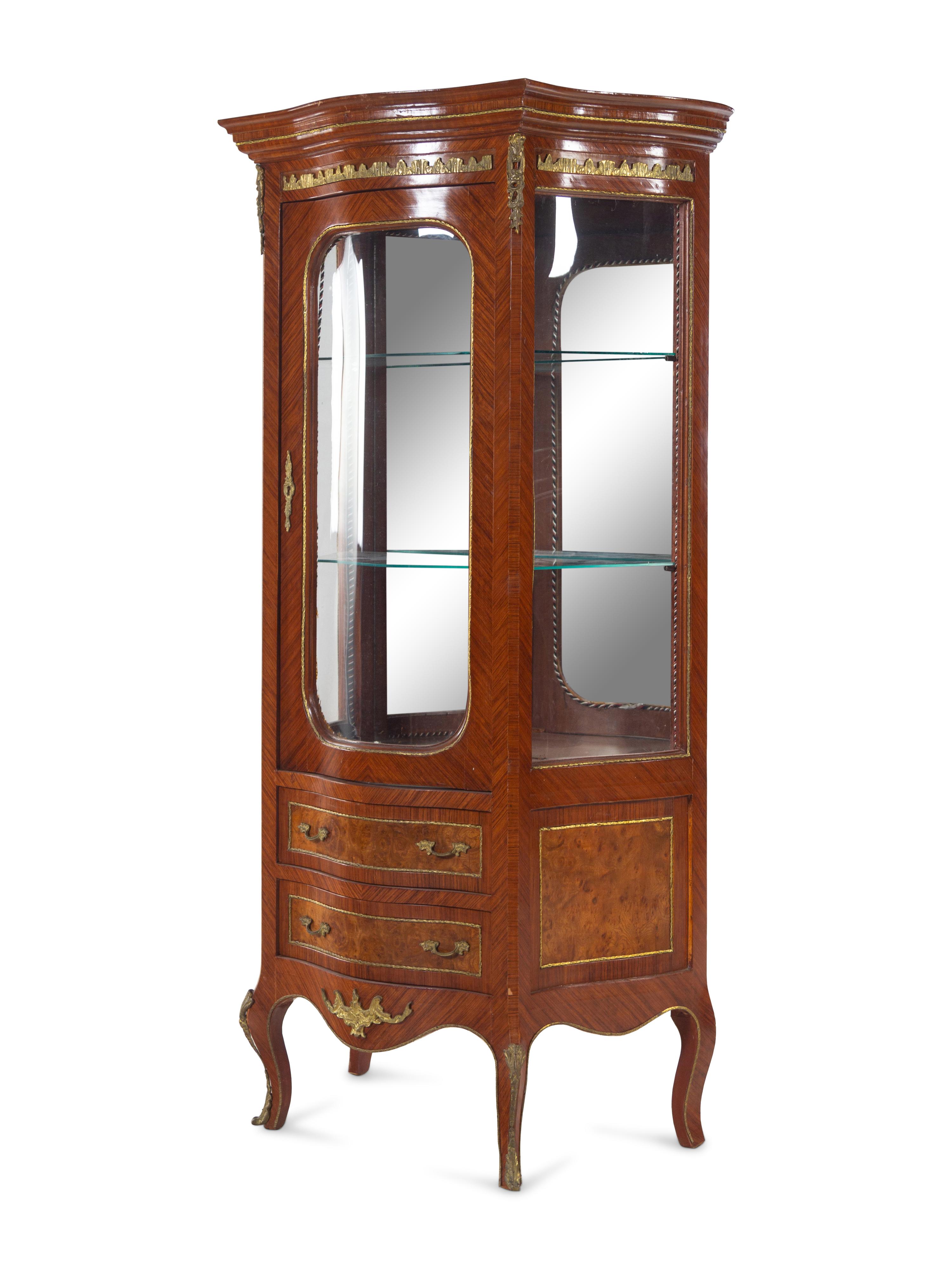 A Louis XV/XVI Transitional Style Gilt Metal Mounted Kingwood Bombe Vitrine Cabinet