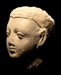 Three Gandharan Fragmentary Stucco Heads and One European Fragmentary Stucco Head
