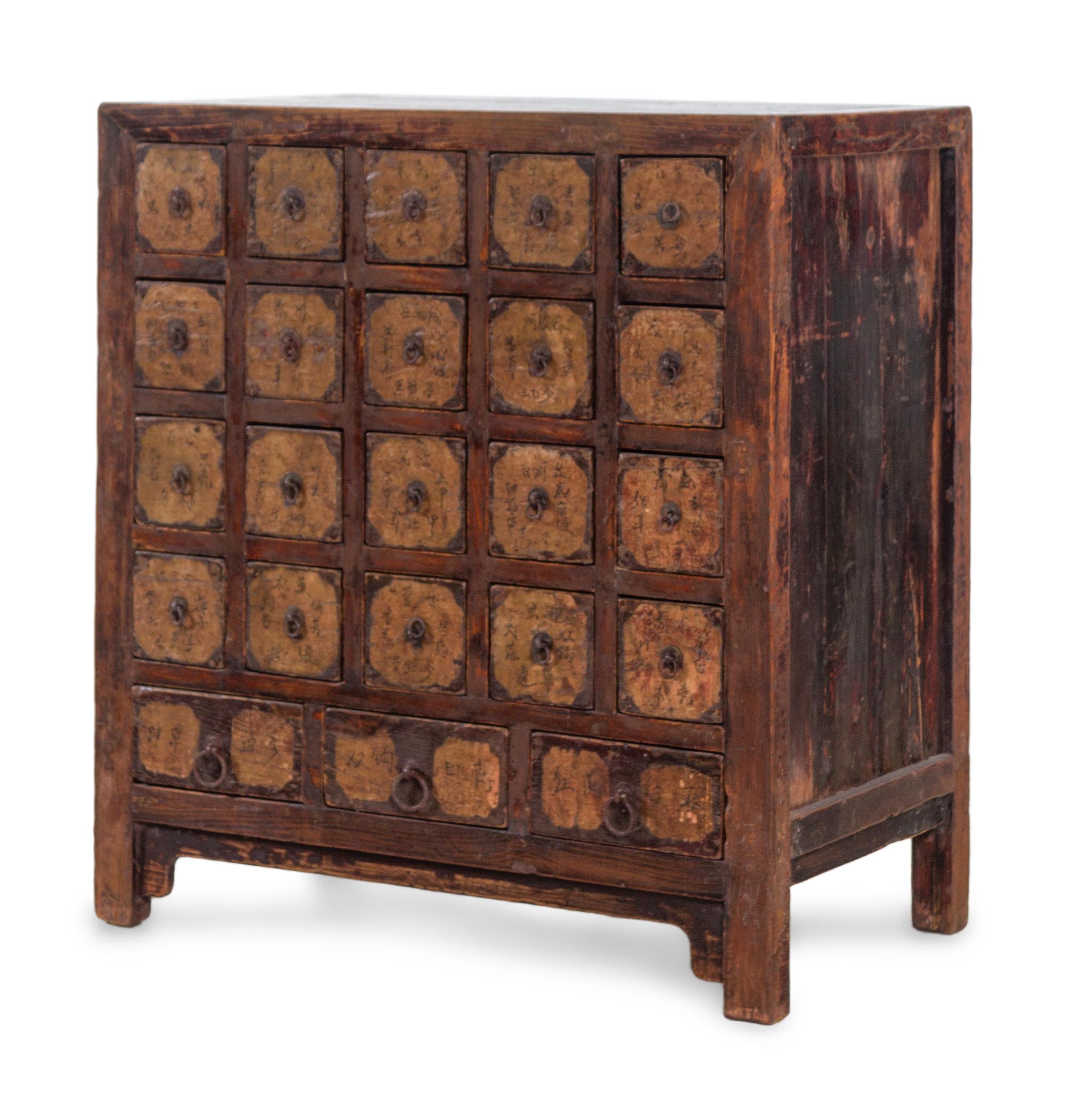 A Chinese Parcel Lacquered Elmwood Medicine Chest