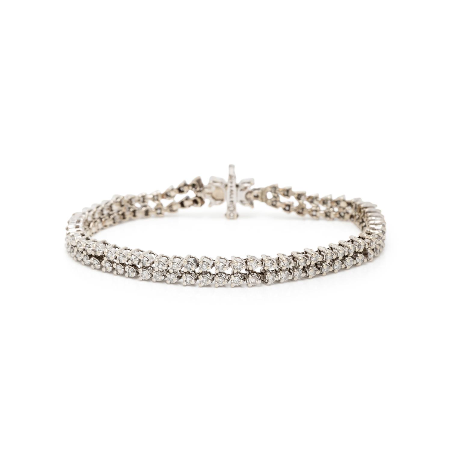 DIAMOND AND WHITE GOLD FLOWER BRACELET AND EARRINGS