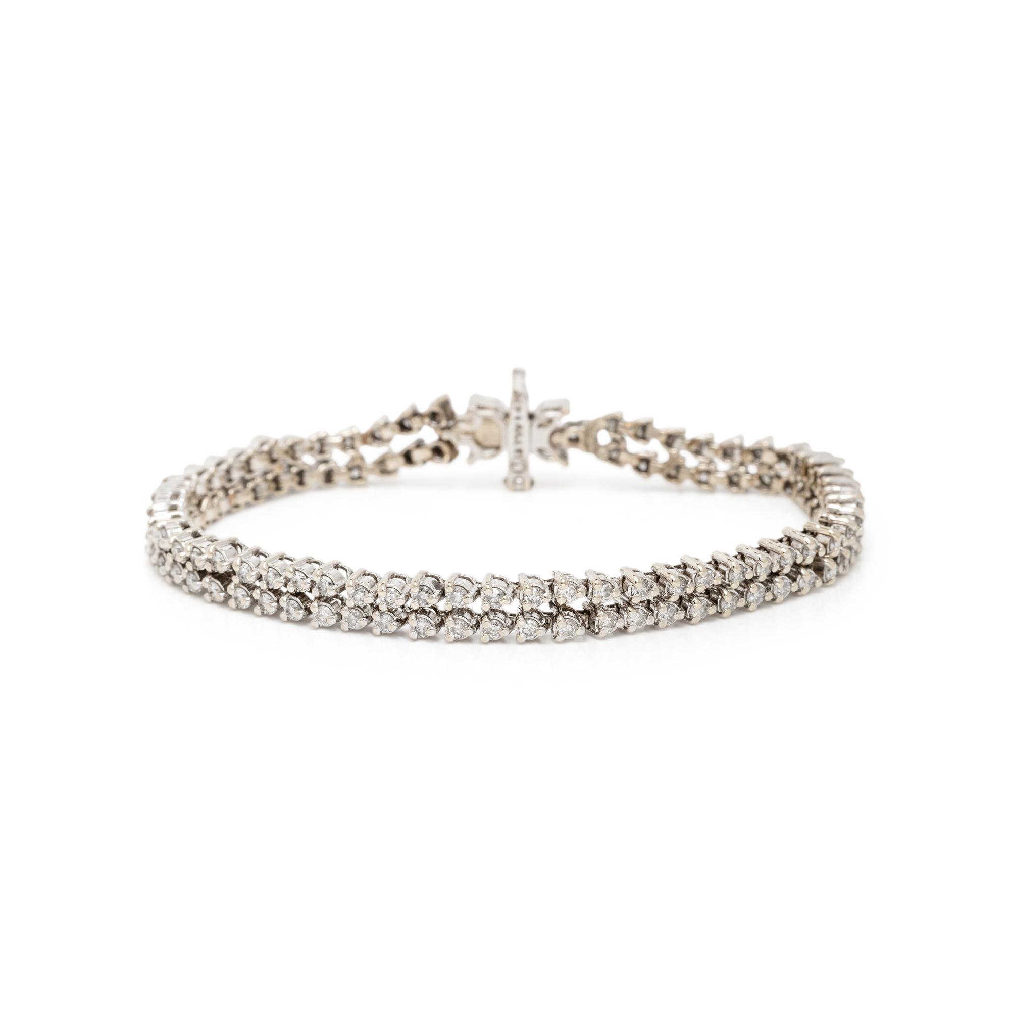 DIAMOND AND WHITE GOLD FLOWER BRACELET AND EARRINGS