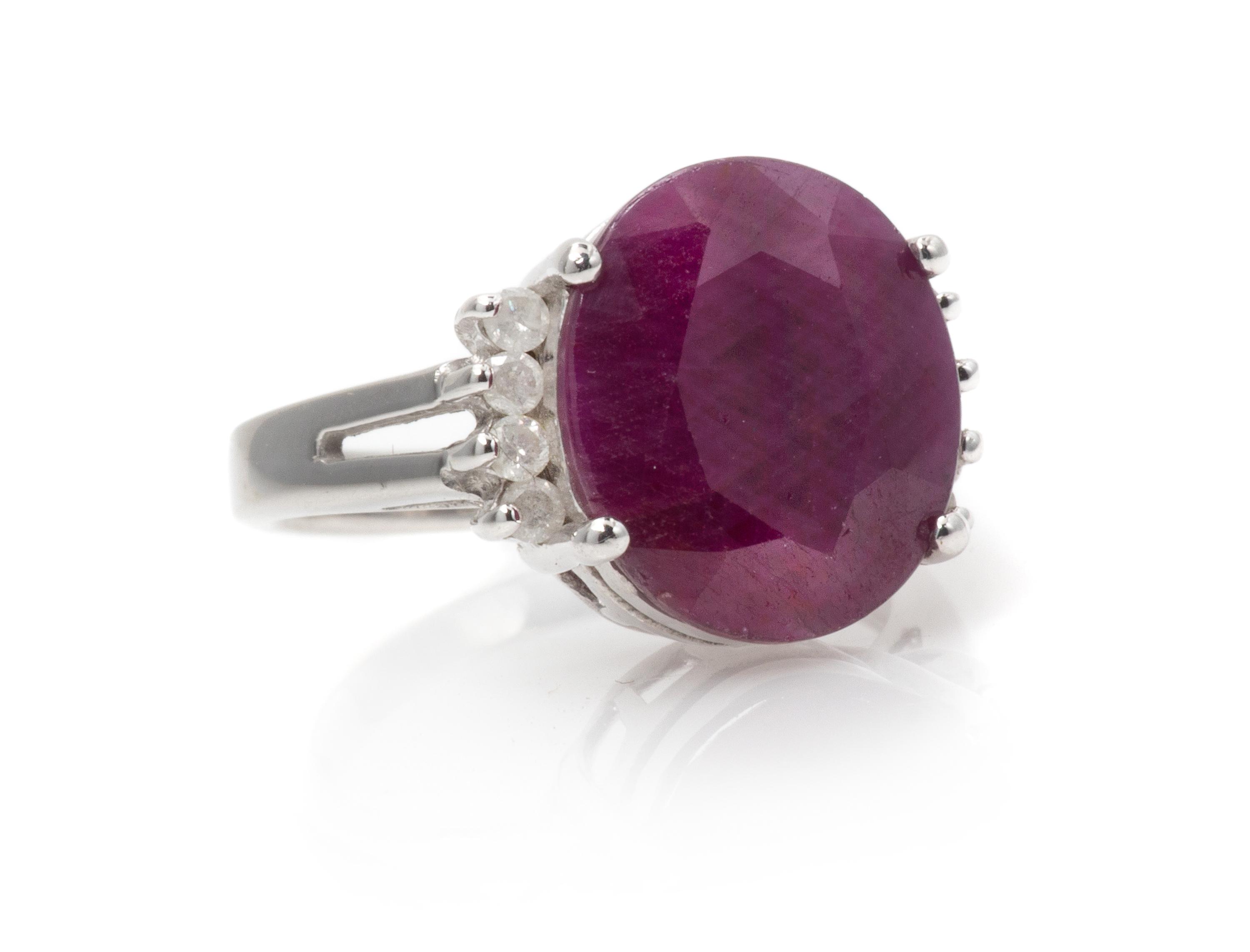 A 14 Karat White Gold, Ruby and Diamond Ring, 6.10 dwts.