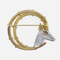 An 18K gold, platinum, diamond, and ruby brooch, Tiffany & Co. Schlumberger, "Ibex"