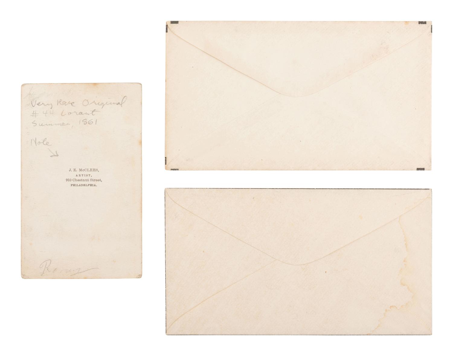 [LINCOLNIANA]. Pair of Lincoln mourning envelopes with CDV portrait.