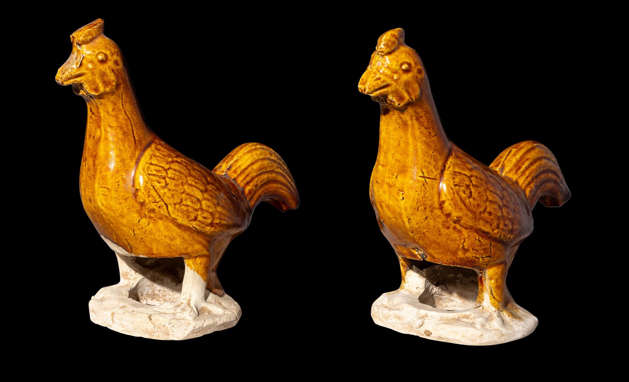 A Pair of Chinese Amber Glazed Pottery Figures of Standing Cockerels