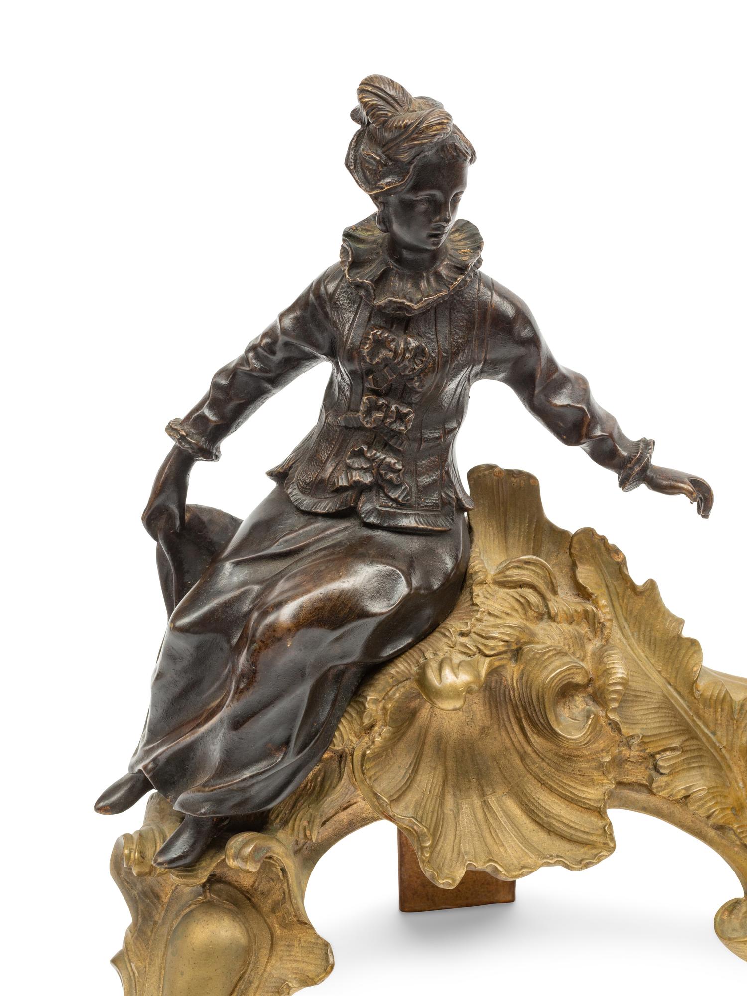 A Pair of Louis XV Style Gilt and Patinated Bronze Figural Chenets